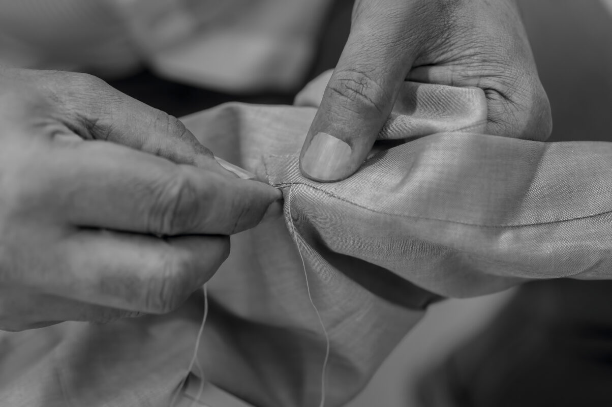 Handgemaakte stitching in mouw